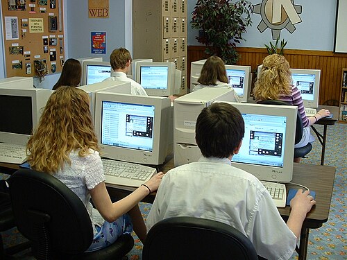 Students taking an exam on computers