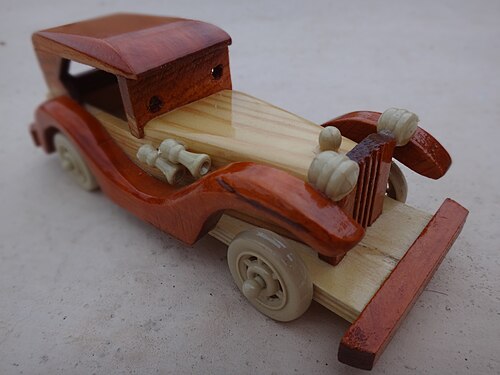 A wooden toy car